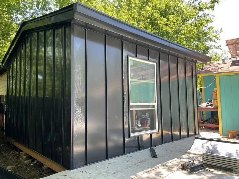 Black standing seam metal wall panels for Roof Inspection in Sugarland Run